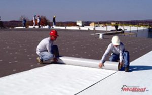 Workers Completing PVC Roof Installation
